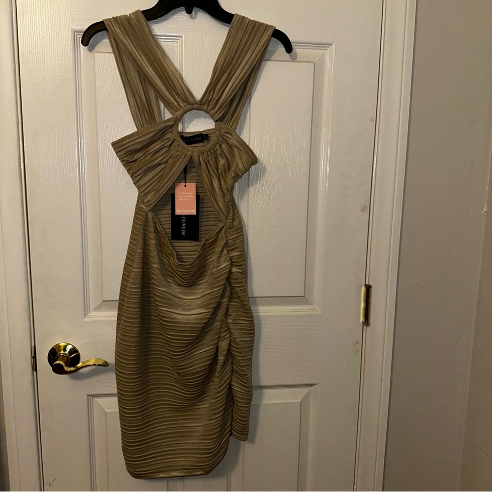 PrettyLittleThing Beige Ribbed Mini Dress Cut Out Design